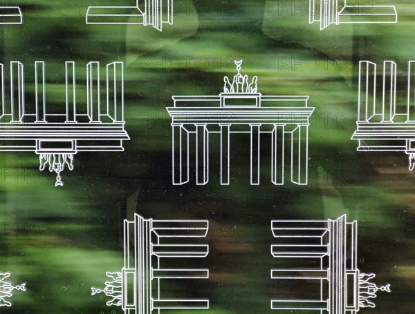 Subway window covered with Brandenburg Gate pattern film to protect against scratching while