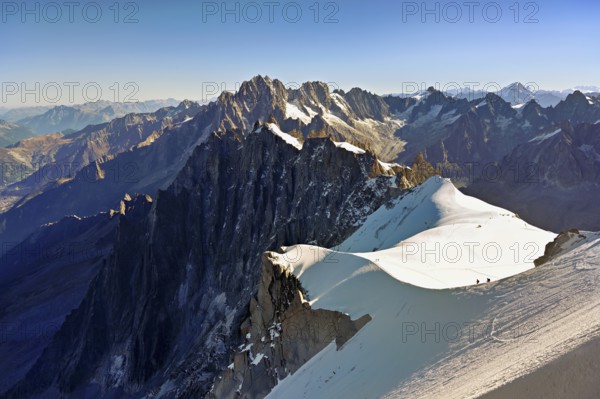 View from the Aiguille du Midi mountain station observation deck of the mountains Aiguille Vert,