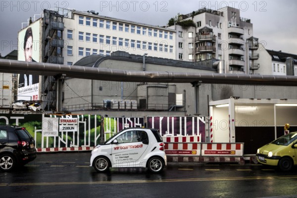 DEU Germany Germany Berlin A smart with the inscription 'economic miracle' in front of a