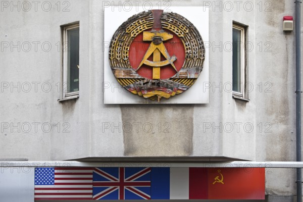 Old building of the Wall Museum — Museum Haus am Checkpoint Charlie with the old coat of arms of