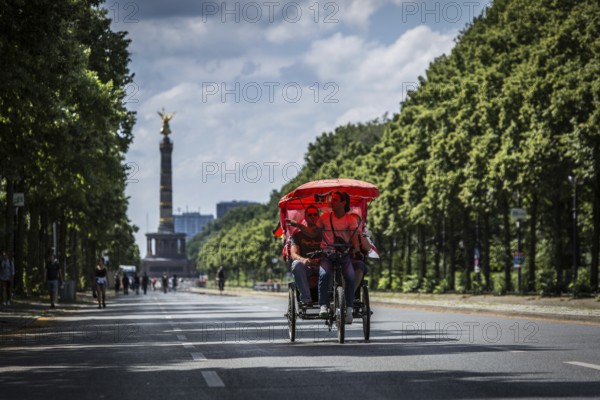DEU Germany Germany Berlin rickshaw driver on June 17 street in Berlin, which is blocked during the