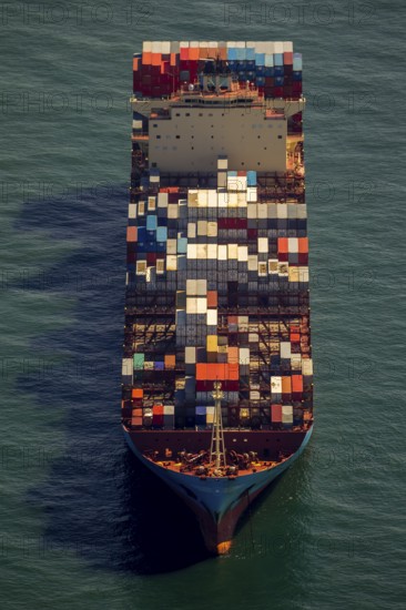 Container ship Maersk Lavras at anchor, aerial view, cargo ships at anchor off Spiekeroog, shipping