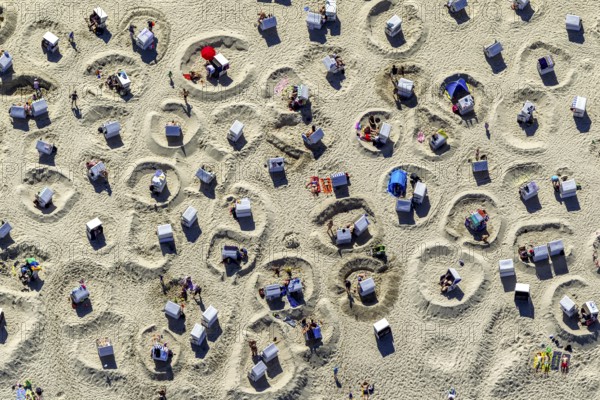 Sandy beach beach with beach chairs and sand walls, sand castles, aerial view, Wangerooge, North