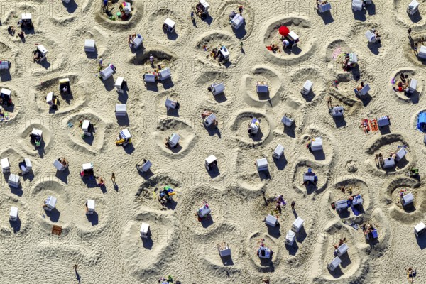 Sandy beach beach with beach chairs and sand walls, sand castles, aerial view, Wangerooge, North