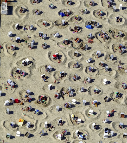 Sandy beach beach with beach chairs and sand walls, sand castles, aerial view, Wangerooge, North