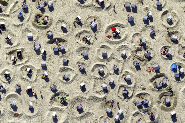 Sandy beach beach with beach chairs and sand walls, sand castles, aerial view, Wangerooge, North