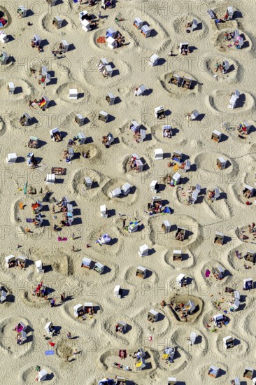 Sandy beach beach with beach chairs and sand walls, sand castles, aerial view, Wangerooge, North