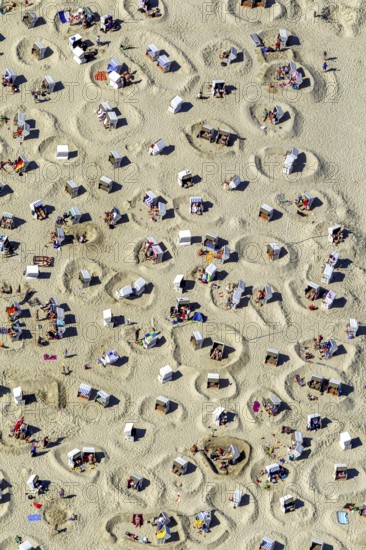 Sandy beach beach with beach chairs and sand walls, sand castles, aerial view, Wangerooge, North