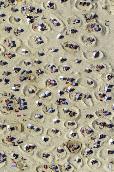 Sandy beach beach with beach chairs and sand walls, sand castles, aerial view, Wangerooge, North