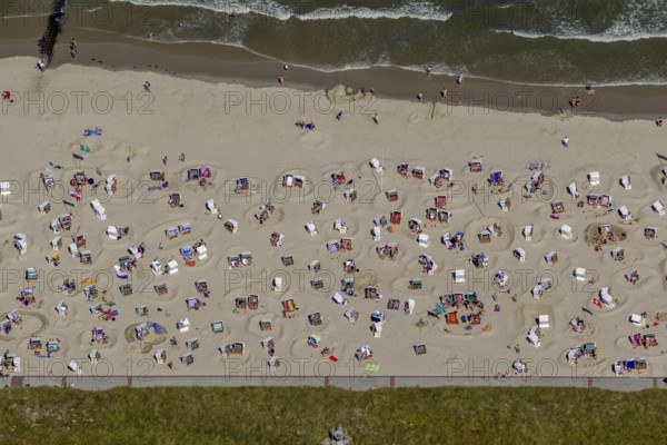 Sandy beach beach with beach chairs and sand walls, sand castles, aerial view, Wangerooge, North