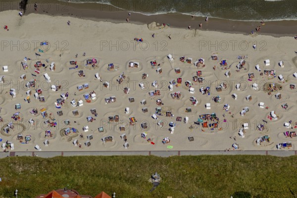 Sandy beach beach with beach chairs and sand walls, sand castles, aerial view, Wangerooge, North