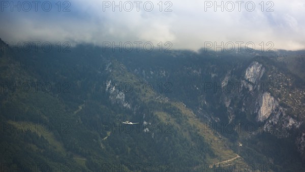 Motorised glider flying over the Alps, Salzburg, Alps, Austria, Europe, aerial view, birds-eyes