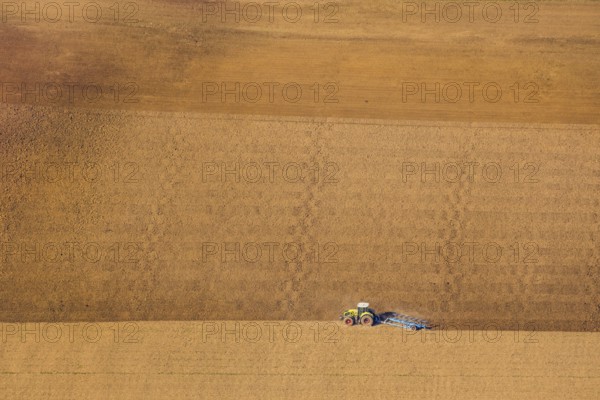 Aerial view, tractor in the field, harvest time, harrowing, Bergheim, Steinheim,