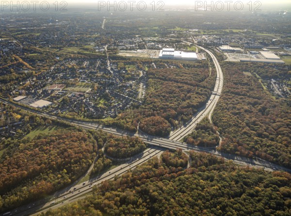 Aerial view, motorway junction Oberhausen, motorway A2, federal road B516, forest area in autumn