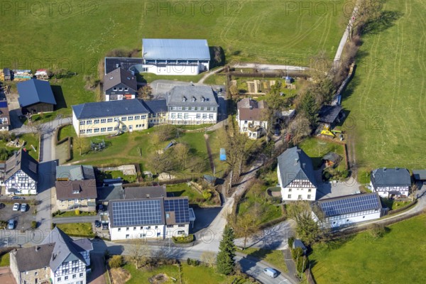 Aerial view, Catholic primary school Helleferld, residential buildings with solar roofs, Hellefeld,