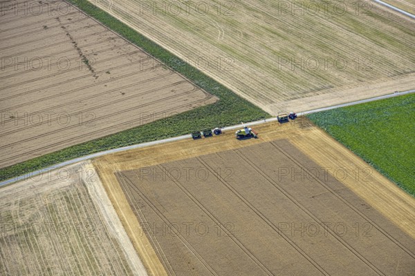 Aerial view, harvesting vehicles with straw bales in Ruploh, grain harvest, fields, Soest, Soester