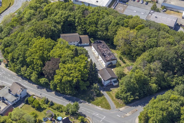 Aerial view, burnt down, destroyed OBDACHLOSENASY, former company building Autoreifen und Autoteile