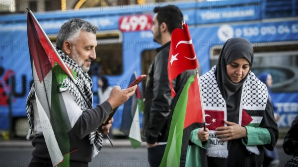 Gaziantep, Türkiye – October 11, 2025: Children and women wearing keffiyehs and carrying