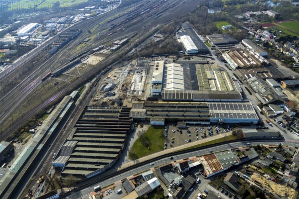 Aerial view, construction site on the WDI site between the railway embankment and