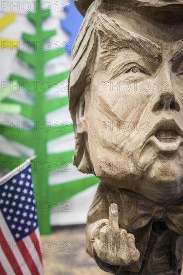 DEU Germany Germany Berlin The bust of US President Donald Trump, made by a chainsaw artist, at the