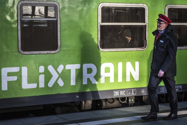 DEU Germany Germany Berlin A railway employee passes a Flixtrain during the EVG strike at the main
