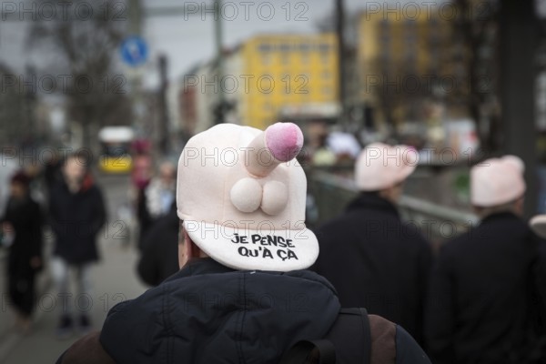 DEU Germany Germany Berlin A man wears a cap with a penis through Friedrichshain during a bachelor