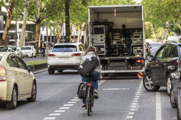 DEU Germany Germany Berlin A cyclist has to avoid a lorry parked in a cycle lane on Budapester