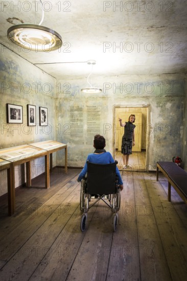 DEU Germany Germany Berlin Disabled tourist in a wheelchair explores Berlin with a city guide. Otto