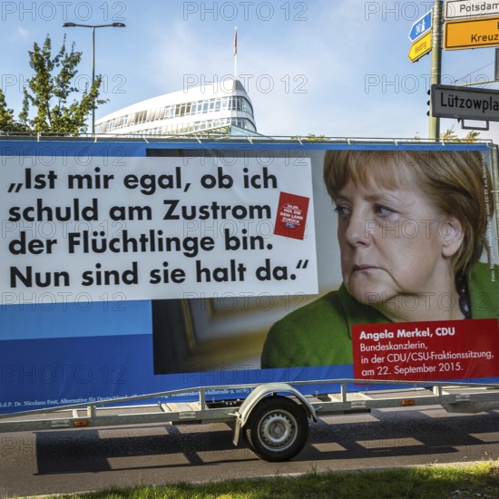 DEU Germany Germany Berlin Supporters with AFD poster against Merkel's refugee policy in front of