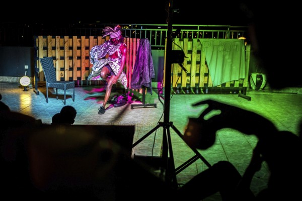 RWA RWANDA RUANDA Kigali A performance by the dancer Shema Isaak on the terrace of the Panorama Bar