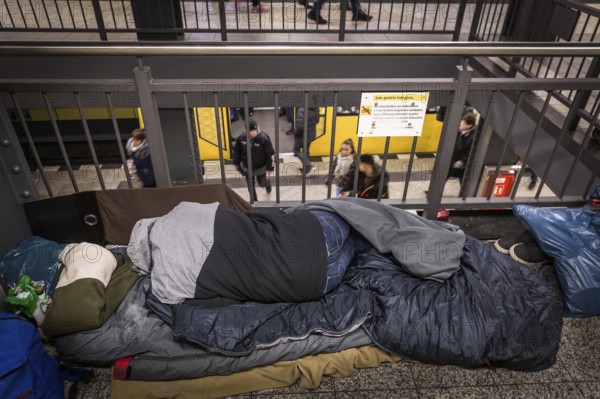 DEU Germany Germany Berlin Homeless people spend the night in a passageway at Lichtenberg