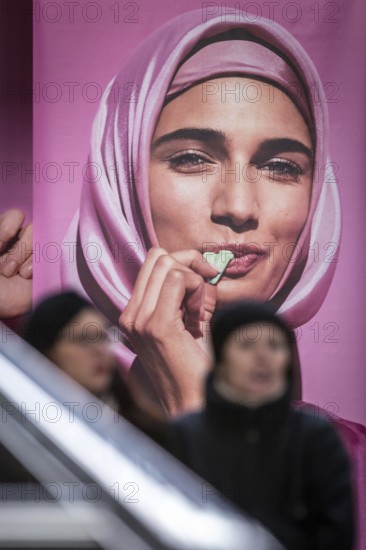 DEU Germany Germany Berlin An advertising banner with a Muslim woman promoting Katjes vegetarian