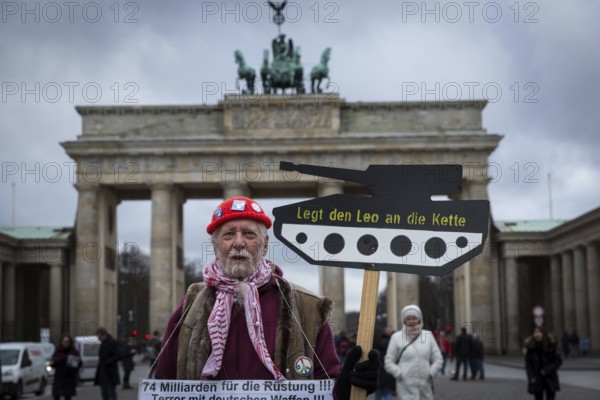 DEU Germany Germany Berlin A demonstrator protesting against arms deliveries to Turkey in front of