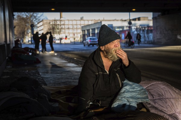 DEU Germany Germany Berlin Scenes of homeless people around Bahnhof Zoo.Gerard on his bed under a