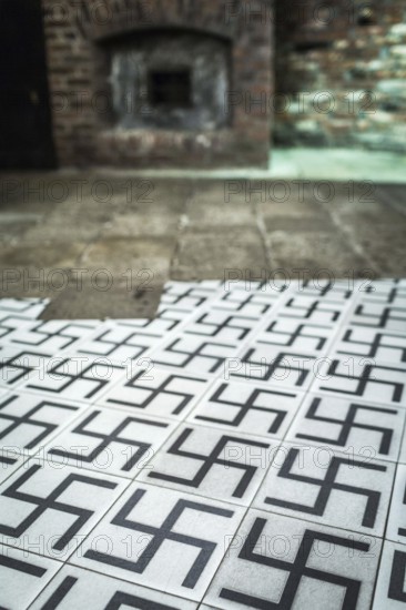 POL Poland Poland Krakow Krakow Tiles with swastikas in the exhibition of the Oskar Schindler