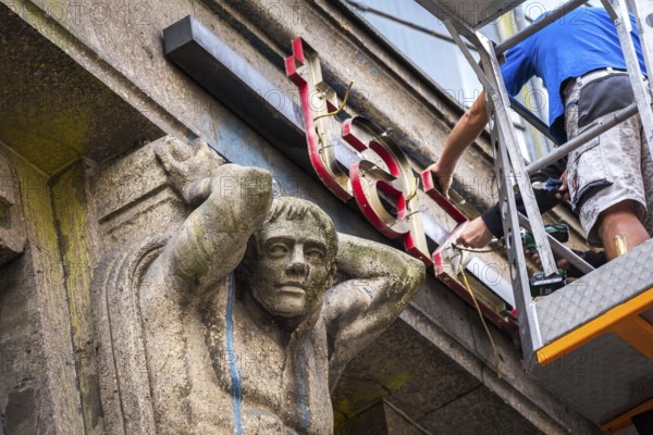 DEU Germany Germany Berlin The dismantling of the TAZ lettering on the old TAZ building on