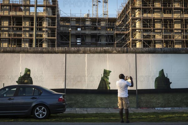 DEU Germany Germany Berlin A tourist takes a mobile phone photo of the installation 'Beyond the