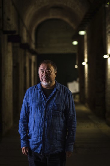 DEU Germany Germany Berlin The Chinese artist Ai Weiwei in his studio in the vaulted cellar of the