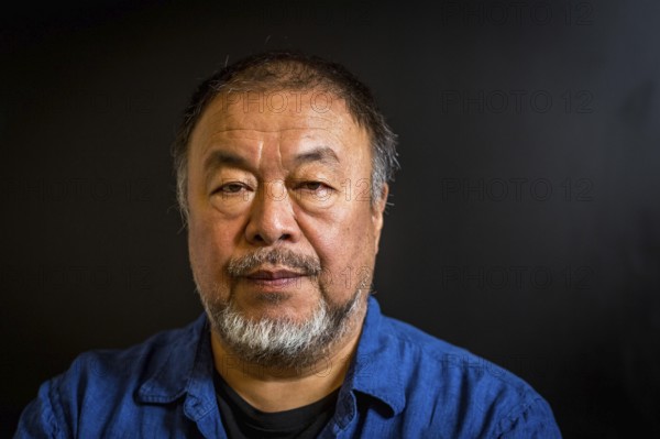 DEU Germany Germany Berlin The Chinese artist Ai Weiwei in his studio in the vaulted cellar of the