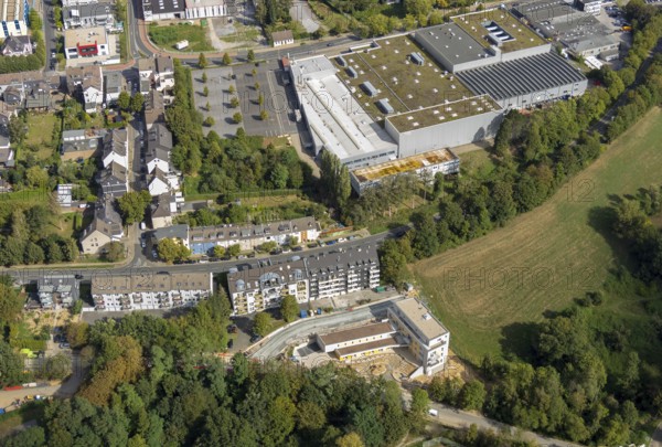 Aerial view, construction site, new multi-family house with day care centre,