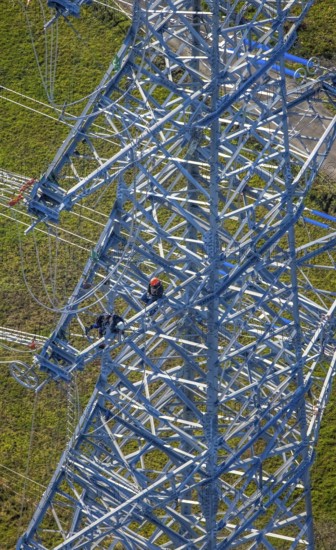 Aerial photo, construction power line Dortmund-Hagen, climber in power pylon, worker, height