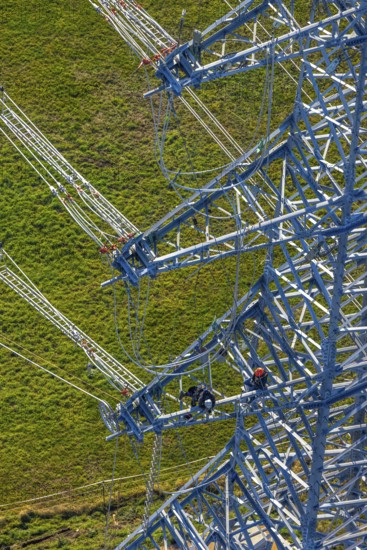 Aerial photo, construction power line Dortmund-Hagen, climber in power pylon, worker, height