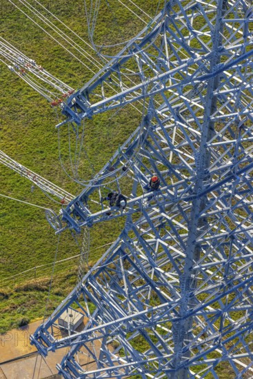 Aerial photo, construction power line Dortmund-Hagen, climber in power pylon, worker, height