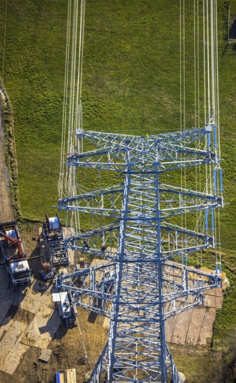 Aerial photo, construction power line Dortmund-Hagen, climber in power pylon, worker, height