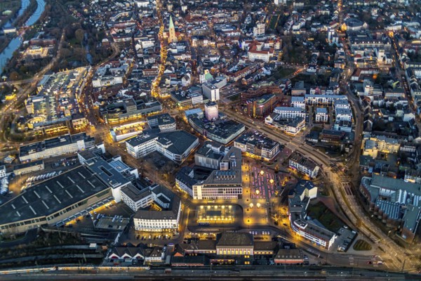 Aerial view, overview of Hamm at night, technical town hall, station forecourt, Alleecenter ECE,