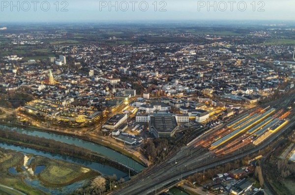 Aerial view, overview of Hamm at night, technical town hall, station forecourt, Alleecenter ECE,