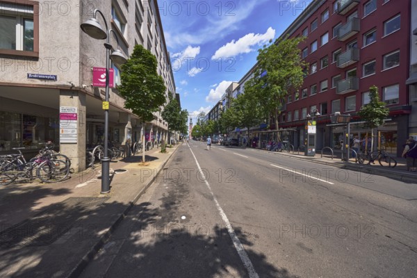 Residential and commercial buildings, general architecture, traffic area, street, lantern, bus stop