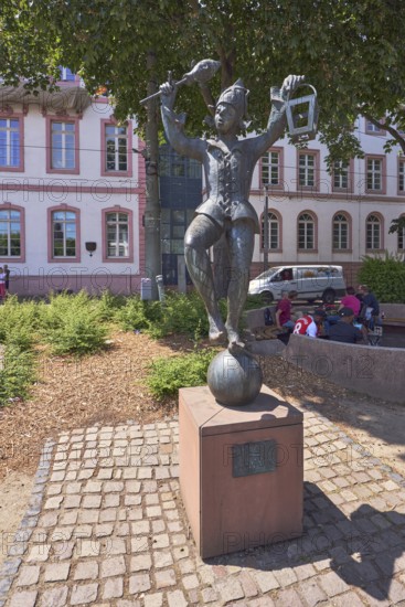 Bajazz with the lantern, metal sculpture, sculptor Inge Blum, paving stone walkway, historic