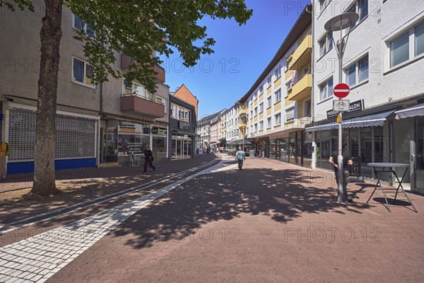 City center, retail, shopping, outdoor area of a restaurant, residential buildings and commercial