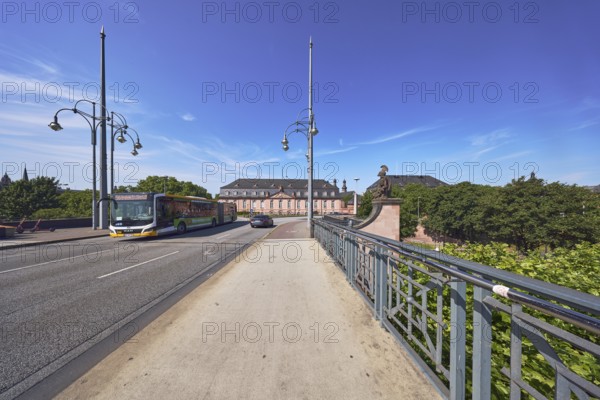 Car bridge and footbridge, bridge railing, bridgehead, lantern, public bus, line 56 bus, sidewalk,